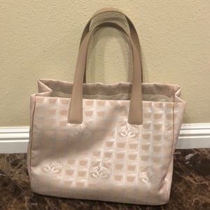 Authentic Chanel travel line tote in beige